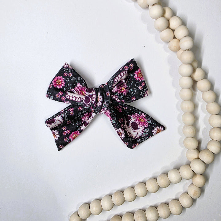 Let Go To Regrow Dainty Bow (on clips)