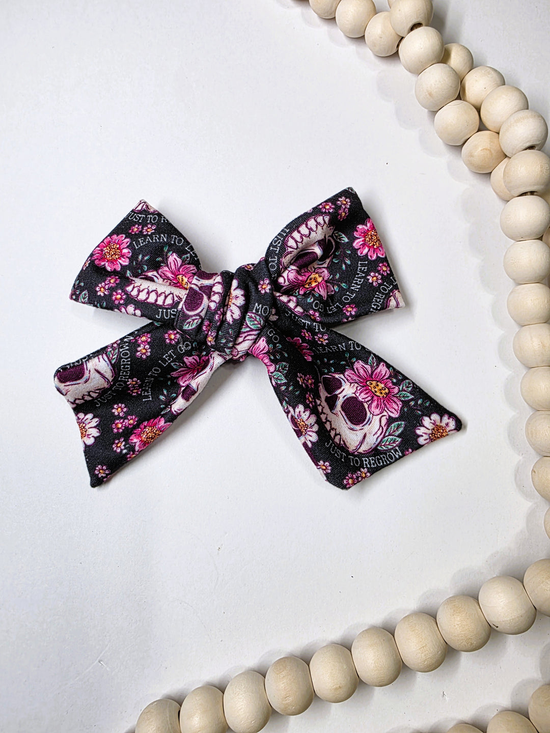 Let Go To Regrow Dainty Bow (on clips)