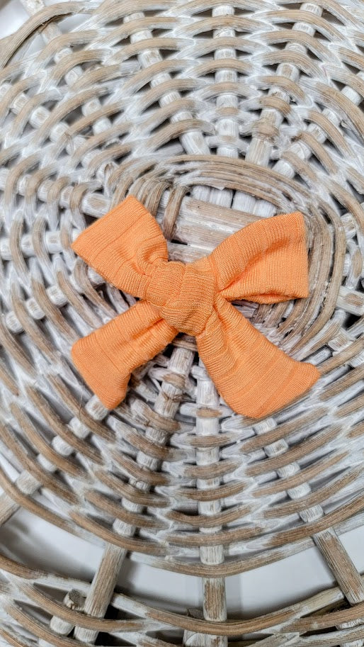 Pastel Orange Dainty Bow (on clips)
